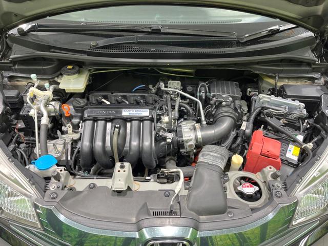 フィットハイブリッド Lパッケージ 4WD 純正SDナビ バックカメラ 禁煙車 ハーフレザーシート ドラレコ スマートキー LEDヘッド ビルトインETC クルコン 純正15インチアルミ オートライト オートエアコン(18枚目)