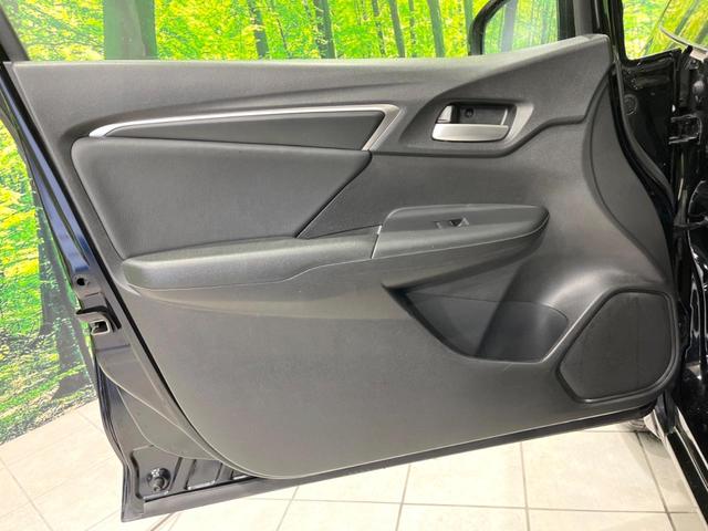 フィットハイブリッド Lパッケージ 4WD 純正SDナビ バックカメラ 禁煙車 ハーフレザーシート ドラレコ スマートキー LEDヘッド ビルトインETC クルコン 純正15インチアルミ オートライト オートエアコン(25枚目)