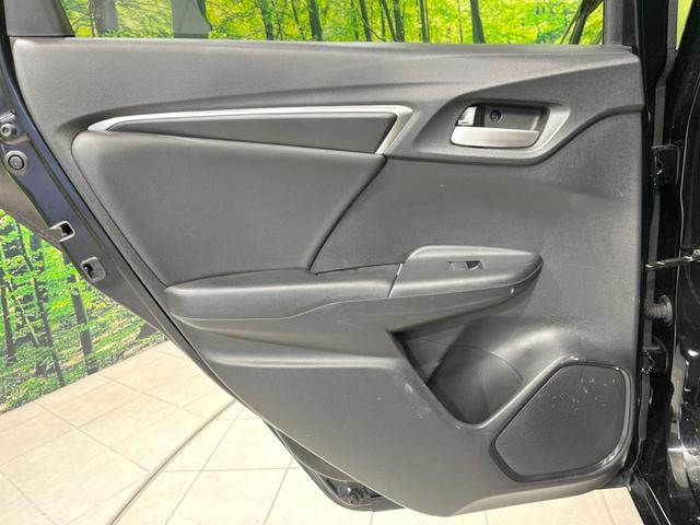 フィットハイブリッド Lパッケージ 4WD 純正SDナビ バックカメラ 禁煙車 ハーフレザーシート ドラレコ スマートキー LEDヘッド ビルトインETC クルコン 純正15インチアルミ オートライト オートエアコン(26枚目)
