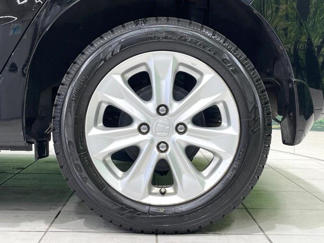 フィットハイブリッド Lパッケージ 4WD 純正SDナビ バックカメラ 禁煙車 ハーフレザーシート ドラレコ スマートキー LEDヘッド ビルトインETC クルコン 純正15インチアルミ オートライト オートエアコン(58枚目)