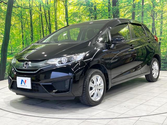 フィットハイブリッド Lパッケージ 4WD 純正SDナビ バックカメラ 禁煙車 ハーフレザーシート ドラレコ スマートキー LEDヘッド ビルトインETC クルコン 純正15インチアルミ オートライト オートエアコン(62枚目)
