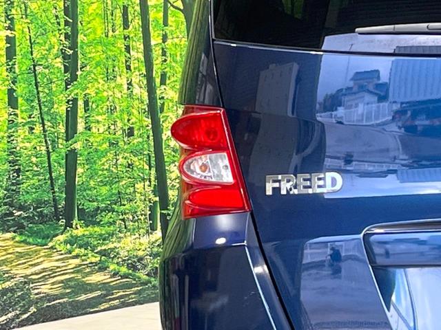 フリード Ｇ　エアロ　ジャストセレクション　電動スライドドア　ディスプレイオーディオ　バックカメラ　禁煙車　ＨＩＤヘッド　ＥＴＣ　オートエアコン　オートライト　Ｂｌｕｅｔｏｏｔｈ接続　ＬＥＤフォグ　電動格納ミラー　盗難防止措置（29枚目）