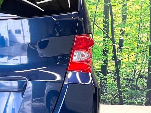 フリード Ｇ　エアロ　ジャストセレクション　電動スライドドア　ディスプレイオーディオ　バックカメラ　禁煙車　ＨＩＤヘッド　ＥＴＣ　オートエアコン　オートライト　Ｂｌｕｅｔｏｏｔｈ接続　ＬＥＤフォグ　電動格納ミラー　盗難防止措置（30枚目）