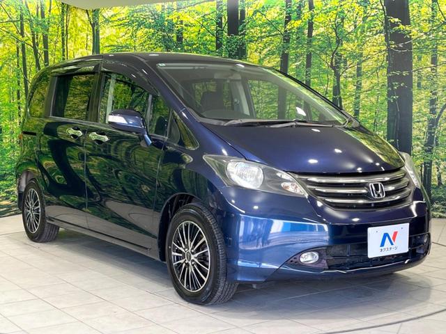 フリード Ｇ　エアロ　ジャストセレクション　電動スライドドア　ディスプレイオーディオ　バックカメラ　禁煙車　ＨＩＤヘッド　ＥＴＣ　オートエアコン　オートライト　Ｂｌｕｅｔｏｏｔｈ接続　ＬＥＤフォグ　電動格納ミラー　盗難防止措置（56枚目）