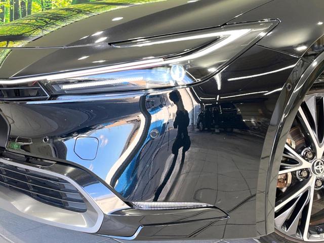 プリウス Z ガラスルーフ 全周囲カメラ 100V電源 12.3型ディスプレイオーディオ 衝突被害軽減システム レーダークルーズ 禁煙車 電動リアゲート ハーフレザーシート 前席シートエアコン パワーシート(12枚目)