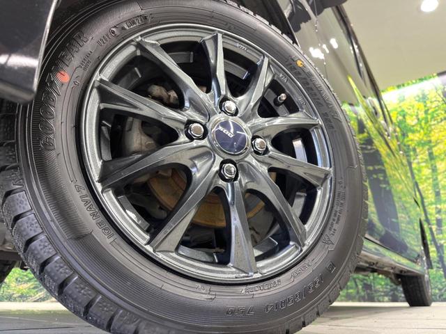 タント カスタムＲＳ　４ＷＤ　電動スライドドア　純正ＨＤＤナビ　バックカメラ　禁煙車　ＨＩＤヘッド　ＥＴＣ　オートエアコン　ＣＤ　ＤＶＤ再生　衝突安全ボディ　盗難防止措置　プライバシーガラス（13枚目）