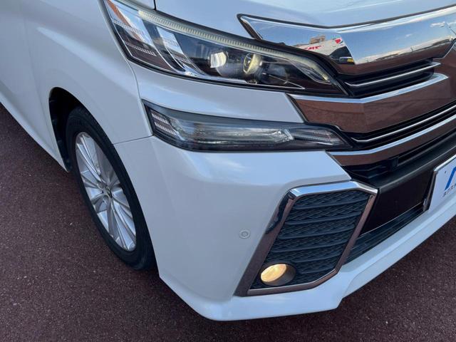 ヴェルファイア ２．５Ｚ　両側電動ドア　後席モニター　バックカメラ　衝突被害軽減システム　レーダークルーズ　禁煙車　コーナーセンサー　スマートキー　ＬＥＤヘッド　ビルトインＥＴＣ　純正１８インチアルミ　オートライト（14枚目）