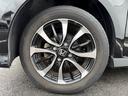 純正アルミホイールです。タイヤサイズは、155/65R14です。