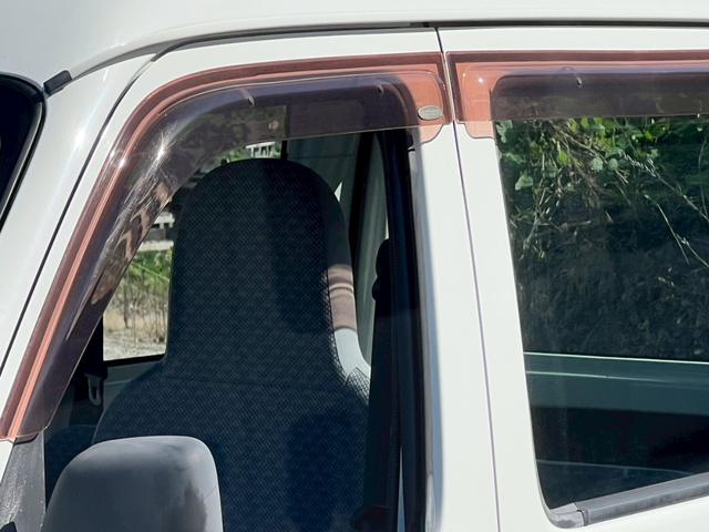 ハイゼットカーゴ スペシャル　運転席エアバック・助手席エアバック・エアコン・クーラー・パワステ・両側スライドドア・純正ラジオ・シガーライター・ヘッドライトレペライザー・フロアマット・ドアバイザー・スペアタイヤ・軽バン・４ＡＴ（35枚目）