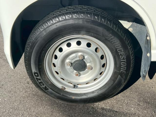 ハイゼットカーゴ スペシャル　運転席エアバック・助手席エアバック・エアコン・クーラー・パワステ・ＥＴＣ・両側スライドドア・純正ラジオ・シガーライター・ヘッドライトレペライザー・フロアマット・ドアバイザー・スペアタイヤ・取扱証明書（77枚目）