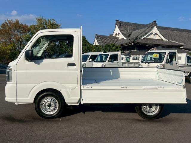 キャリイトラック KCエアコン・パワステ農繁仕様 運転席エアバック・助手席エアバック・ABS・横滑り防止装置・エアコン・クーラー・パワステ・パワーウィンドウ・キーレス・4WD・禁煙車・アオリプロテクター・トリイプロテクター・荷台ランプ・純正ラジオ(52枚目)