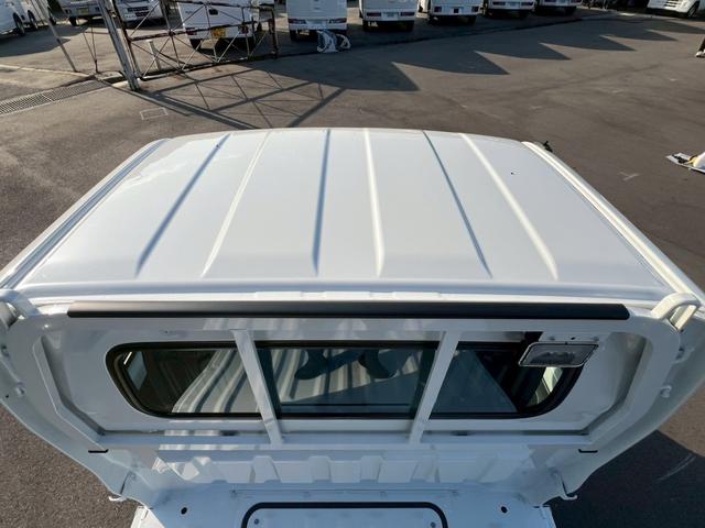 キャリイトラック KCエアコン・パワステ農繁仕様 運転席エアバック・助手席エアバック・ABS・横滑り防止装置・エアコン・クーラー・パワステ・パワーウィンドウ・キーレス・4WD・禁煙車・アオリプロテクター・トリイプロテクター・荷台ランプ・純正ラジオ(64枚目)