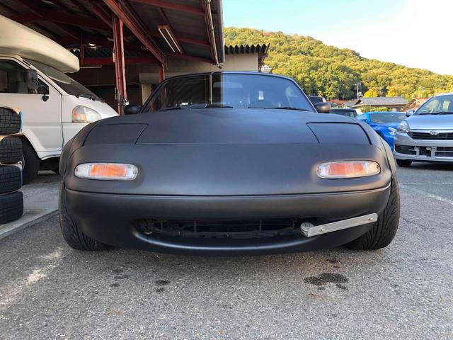 ユーノスロードスター Ｓスペシャル　５ＭＴ　テイン車高調　ハードトップ　モモステアリング　１５インチアルミホイール　オーバーフェンダー　ＣＤ　Ｂｌｕｅｔｏｏｔｈ　替つや消しブラック塗装　エアコン（10枚目）