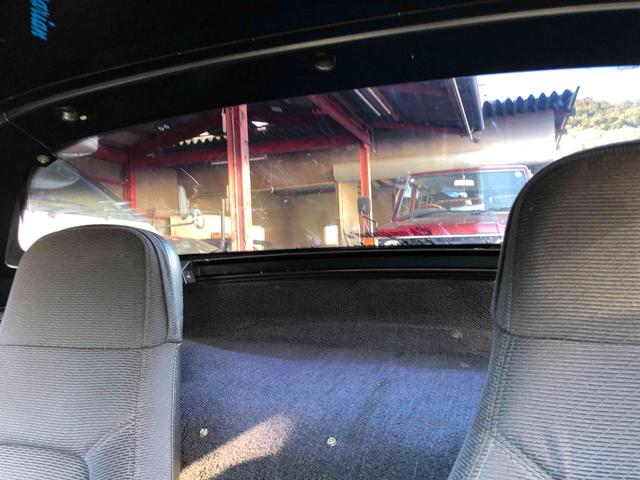 ユーノスロードスター Ｓスペシャル　５ＭＴ　テイン車高調　ハードトップ　モモステアリング　１５インチアルミホイール　オーバーフェンダー　ＣＤ　Ｂｌｕｅｔｏｏｔｈ　替つや消しブラック塗装　エアコン（43枚目）