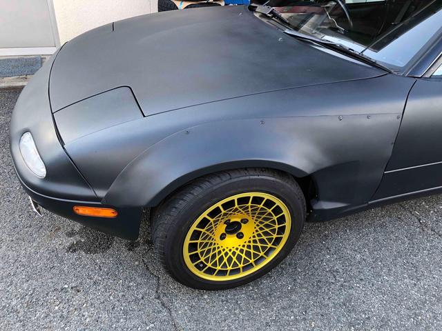 ユーノスロードスター Ｓスペシャル　５ＭＴ　テイン車高調　ハードトップ　モモステアリング　１５インチアルミホイール　オーバーフェンダー　ＣＤ　Ｂｌｕｅｔｏｏｔｈ　替つや消しブラック塗装　エアコン（45枚目）