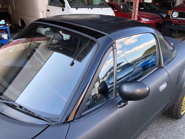 ユーノスロードスター Ｓスペシャル　５ＭＴ　テイン車高調　ハードトップ　モモステアリング　１５インチアルミホイール　オーバーフェンダー　ＣＤ　Ｂｌｕｅｔｏｏｔｈ　替つや消しブラック塗装　エアコン（55枚目）