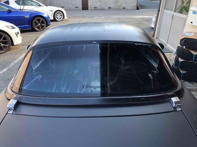 ユーノスロードスター Ｓスペシャル　５ＭＴ　テイン車高調　ハードトップ　モモステアリング　１５インチアルミホイール　オーバーフェンダー　ＣＤ　Ｂｌｕｅｔｏｏｔｈ　替つや消しブラック塗装　エアコン（56枚目）