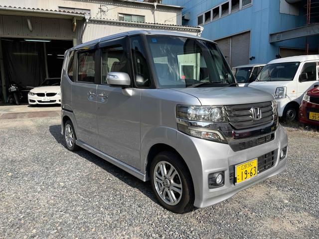 N-BOXカスタム G・Lパッケージ ETC 両側スライド・片側電動 ナビ TV HID スマートキー アイドリングストップ 電動格納ミラー ベンチシート CVT 盗難防止システム ABS ESC CD DVD再生 アルミホイール(2枚目)