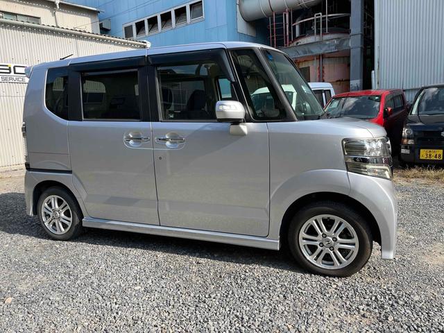 N-BOXカスタム G・Lパッケージ ETC 両側スライド・片側電動 ナビ TV HID スマートキー アイドリングストップ 電動格納ミラー ベンチシート CVT 盗難防止システム ABS ESC CD DVD再生 アルミホイール(3枚目)