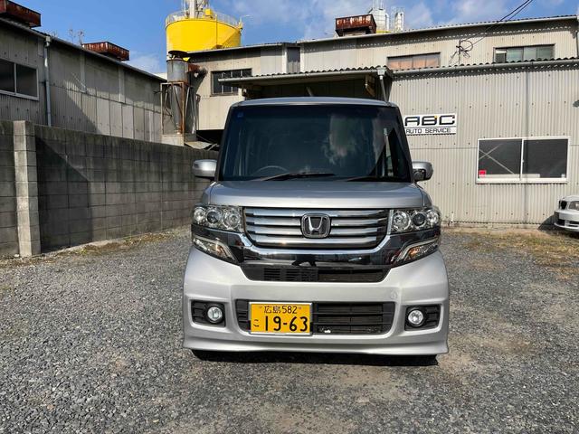 N-BOXカスタム G・Lパッケージ ETC 両側スライド・片側電動 ナビ TV HID スマートキー アイドリングストップ 電動格納ミラー ベンチシート CVT 盗難防止システム ABS ESC CD DVD再生 アルミホイール(19枚目)