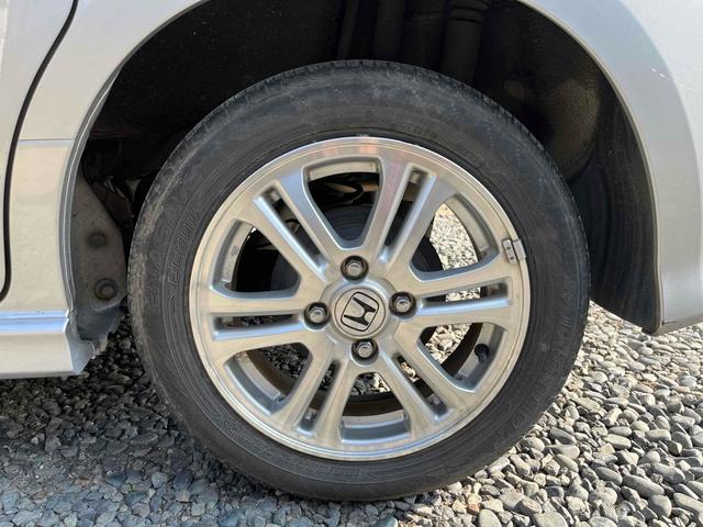 N-BOXカスタム G・Lパッケージ ETC 両側スライド・片側電動 ナビ TV HID スマートキー アイドリングストップ 電動格納ミラー ベンチシート CVT 盗難防止システム ABS ESC CD DVD再生 アルミホイール(21枚目)