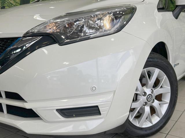 ノート ｅ－パワー　Ｘ　禁煙車　衝突軽減装置　車線逸脱警報　踏み間違い防止装置　ハイビームアシスト　スマートキー　ＥＴＣ　フロント／バックソナー　純正１５インチアルミ　電動格納ミラー　バニティミラー　盗難防止システム（12枚目）