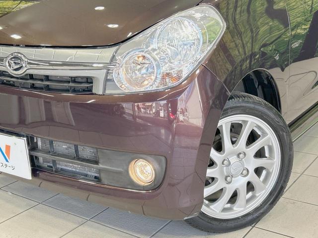 ミラカスタム ＲＳ　純正ナビ　バックカメラ　禁煙車　ＨＩＤヘッド　ターボ　４ＷＤ　ＥＴＣ　オートエアコン　純正１５インチアルミ　革巻きステアリング　電動格納ミラー　スマートキー　盗難防止システム　バニティミラー（12枚目）