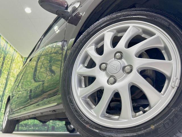 ミラカスタム ＲＳ　純正ナビ　バックカメラ　禁煙車　ＨＩＤヘッド　ターボ　４ＷＤ　ＥＴＣ　オートエアコン　純正１５インチアルミ　革巻きステアリング　電動格納ミラー　スマートキー　盗難防止システム　バニティミラー（13枚目）