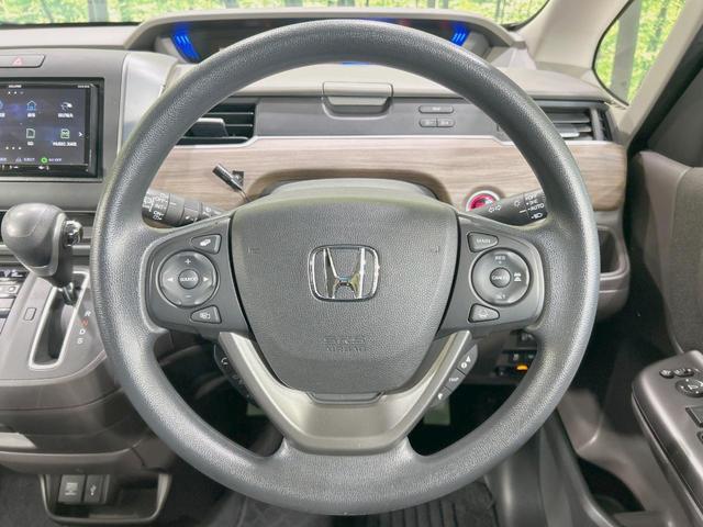 フリード G・ホンダセンシング 両側電動ドア SDナビ 後席モニター 禁煙車 ホンダセンシング アダプティブクルーズ LEDヘッド フルセグ Bluetooth再生 ETC スマートキー オートライト/エアコン 2列目ウォークスルー(12枚目)