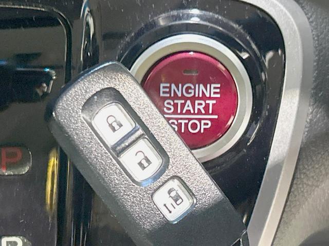 N-BOXカスタム G・Lパッケージ 電動スライドドア SDナビ バックカメラ 禁煙車 スマートキー HIDヘッド ETC オートライト オートエアコン 純正14インチアルミ CD DVD再生 フルセグ(6枚目)