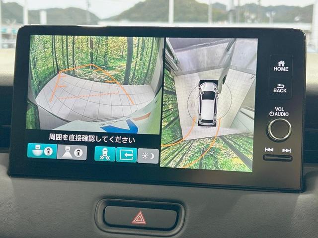 ヴェゼル e:HEV Z 純正9型ナビ 全周囲カメラ 禁煙車 ホンダセンシング アダプティブクルーズ 電動リアゲート ブラインドスポットモニター ハーフレザー シート/ハンドルヒーター 置くだけ充電 スマートキー ETC2.0(4枚目)