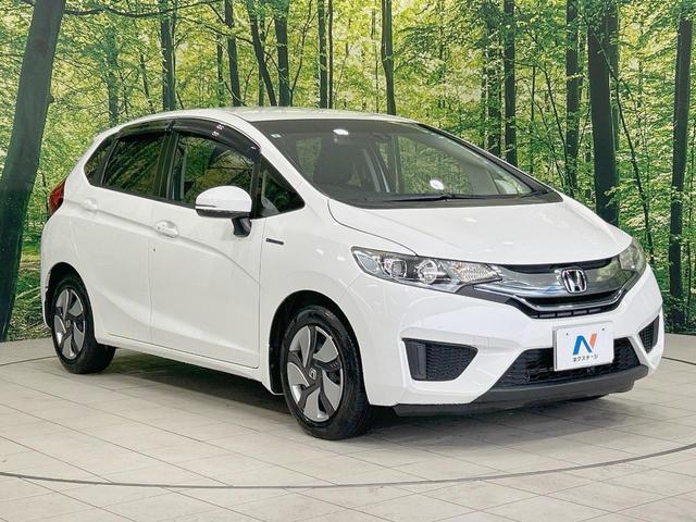フィットハイブリッド Ｌパッケージ　純正ナビ　バックカメラ　衝突軽減　禁煙車　クルコン　ＥＴＣ　ＨＩＤヘッド　Ｂｌｕｅｔｏｏｔｈ　スマートキー　電動格納ミラー　オートライト　オートエアコン　横滑り防止（16枚目）