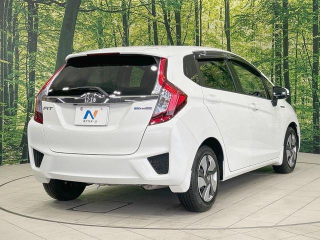 フィットハイブリッド Ｌパッケージ　純正ナビ　バックカメラ　衝突軽減　禁煙車　クルコン　ＥＴＣ　ＨＩＤヘッド　Ｂｌｕｅｔｏｏｔｈ　スマートキー　電動格納ミラー　オートライト　オートエアコン　横滑り防止（17枚目）