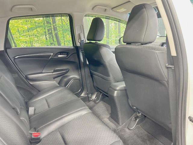 フィットハイブリッド Ｌパッケージ　純正ナビ　バックカメラ　衝突軽減　禁煙車　クルコン　ＥＴＣ　ＨＩＤヘッド　Ｂｌｕｅｔｏｏｔｈ　スマートキー　電動格納ミラー　オートライト　オートエアコン　横滑り防止（34枚目）