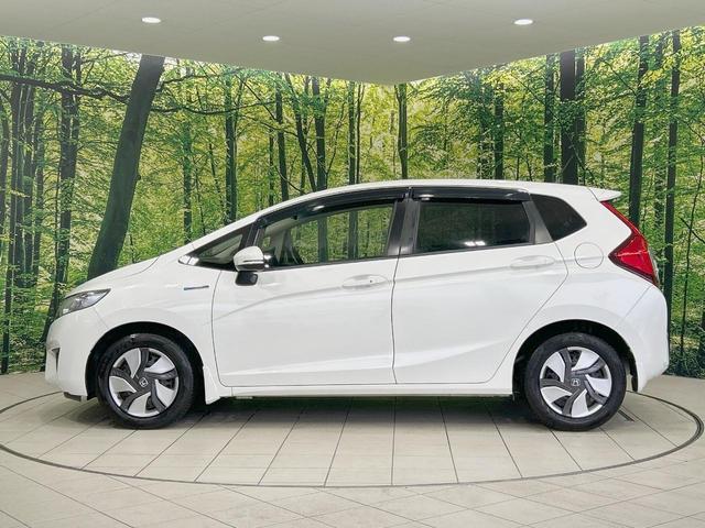 フィットハイブリッド Ｌパッケージ　純正ナビ　バックカメラ　衝突軽減　禁煙車　クルコン　ＥＴＣ　ＨＩＤヘッド　Ｂｌｕｅｔｏｏｔｈ　スマートキー　電動格納ミラー　オートライト　オートエアコン　横滑り防止（53枚目）