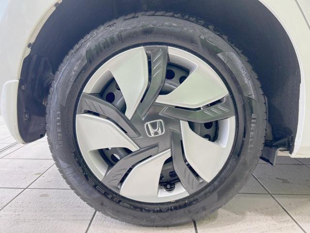 フィットハイブリッド Ｌパッケージ　純正ナビ　バックカメラ　衝突軽減　禁煙車　クルコン　ＥＴＣ　ＨＩＤヘッド　Ｂｌｕｅｔｏｏｔｈ　スマートキー　電動格納ミラー　オートライト　オートエアコン　横滑り防止（58枚目）