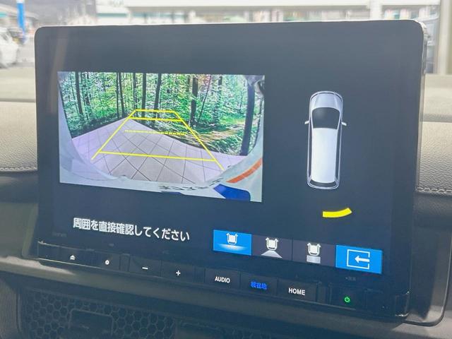 ステップワゴン スパーダ　登録済未使用車　両側電動ドア　純正１１．４インチナビ　バックカメラ　ホンダセンシング　レーダークルーズ　電動リアゲート　ハーフレザーシート　コーナーセンサー　スマートキー　ＬＥＤヘッド（4枚目）