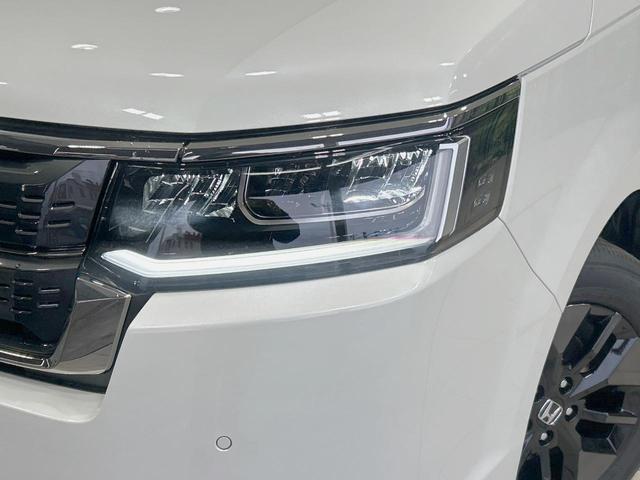 ステップワゴン スパーダ　登録済未使用車　両側電動ドア　純正１１．４インチナビ　バックカメラ　ホンダセンシング　レーダークルーズ　電動リアゲート　ハーフレザーシート　コーナーセンサー　スマートキー　ＬＥＤヘッド（13枚目）