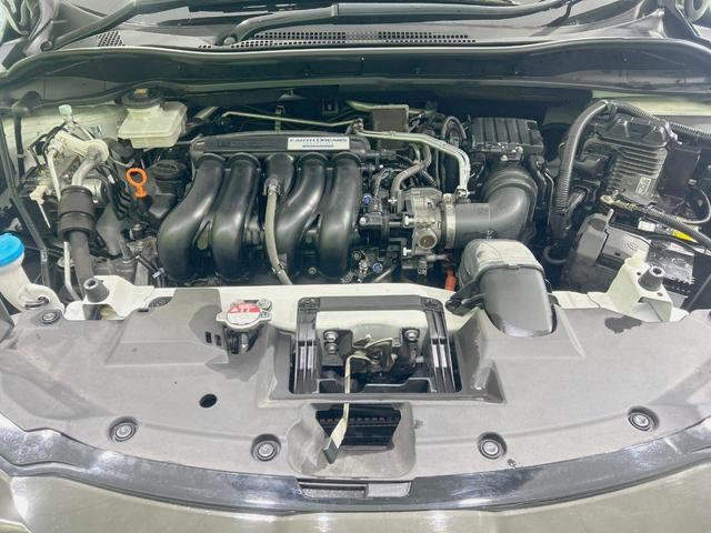 ヴェゼル ハイブリッドＲＳ・ホンダセンシング　ＳＤナビ　禁煙車　バックカメラ　レーダークルーズ　ＥＴＣ　Ｂｌｕｅｔｏｏｔｈ　シートヒーター　ハーフレザー　ＬＥＤヘッド／フォグ　オートライト／エアコン　車線逸脱警報　スマートキー　スピーカー（18枚目）