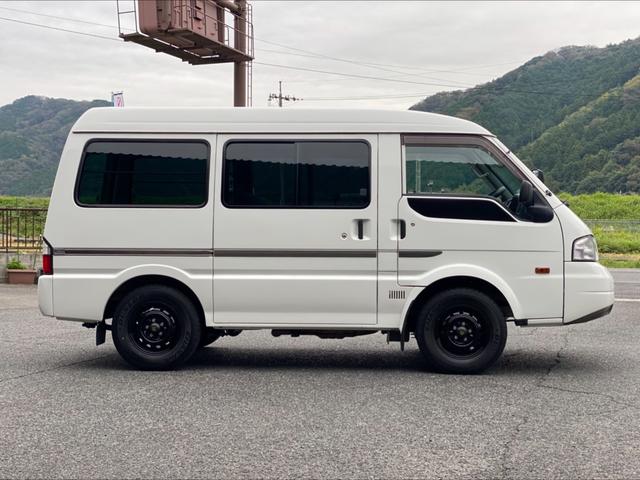 ボンゴバン ＧＬ　低床ハイルーフ　４ＡＴ　４ＷＤ　５人乗り　フルセグＴＶナビ　Ｂｌｕｅｔｏｏｔｈ　ＥＴＣ　前後同色バンパー　パワーウインド　フロアマット　荷室マット　両側スライドドア　積載量９００ｋｇ　禁煙車（27枚目）