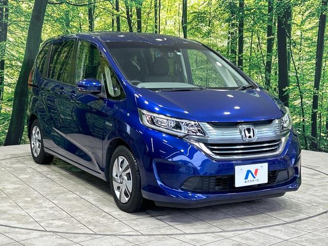 ハイブリッド・Ｇホンダセンシング　両側電動ドア　デジタルインナーミラー　禁煙車　純正９型ナビ　フルセグ　Ｂｌｕｅｔｏｏｔｈ　バックカメラ　ＥＴＣ　アダプティブクルーズ　ＬＥＤヘッドライト　オートライト　プライバシーガラス　スマートキー(18枚目)