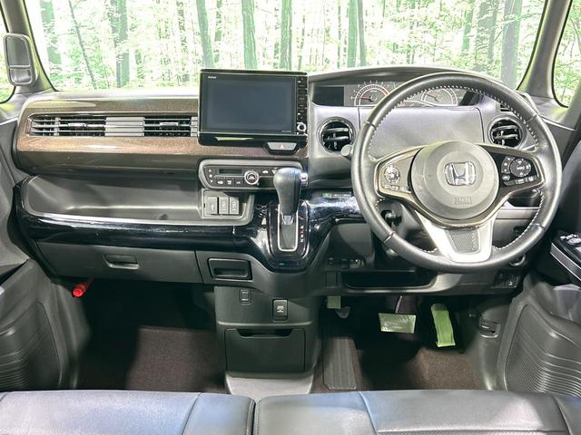 N-BOXカスタム G・Lターボホンダセンシング 純正8型ナビ 両側電動スライドドア 禁煙車 バックカメラ Bluetooth ETC ドラレコ 革調シートカバー LEDヘッドランプ 純正15インチアルミ アダプティブクルーズ オートハイビーム(2枚目)