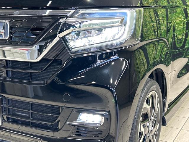 N-BOXカスタム G・Lターボホンダセンシング 純正8型ナビ 両側電動スライドドア 禁煙車 バックカメラ Bluetooth ETC ドラレコ 革調シートカバー LEDヘッドランプ 純正15インチアルミ アダプティブクルーズ オートハイビーム(12枚目)