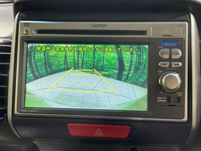 N-BOXカスタム G・ターボパッケージ ターボ 両側電動ドア 純正SDナビ バックカメラ スマートキー HIDヘッド ETC クルコン オートライト オートエアコン 純正15インチアルミ CD DVD再生 地デジ パドルシフト(4枚目)