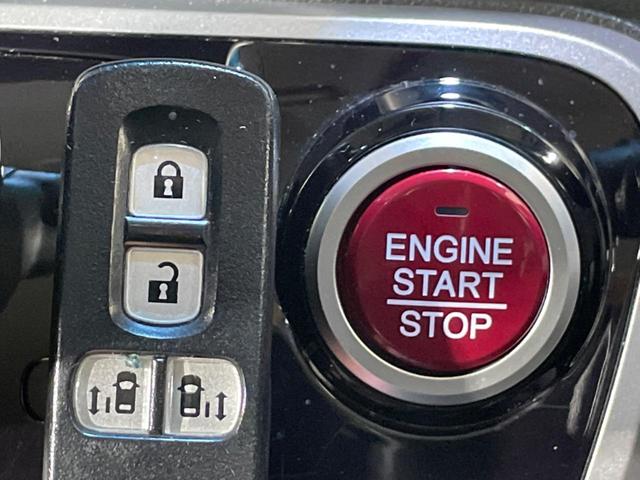 N-BOXカスタム G・ターボパッケージ ターボ 両側電動ドア 純正SDナビ バックカメラ スマートキー HIDヘッド ETC クルコン オートライト オートエアコン 純正15インチアルミ CD DVD再生 地デジ パドルシフト(7枚目)