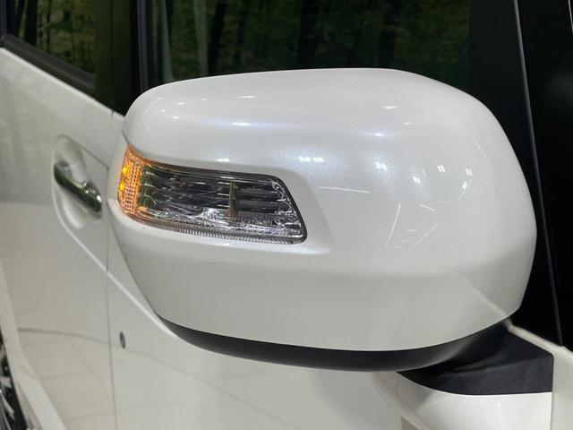 N-BOXカスタム G・ターボパッケージ ターボ 両側電動ドア 純正SDナビ バックカメラ スマートキー HIDヘッド ETC クルコン オートライト オートエアコン 純正15インチアルミ CD DVD再生 地デジ パドルシフト(25枚目)