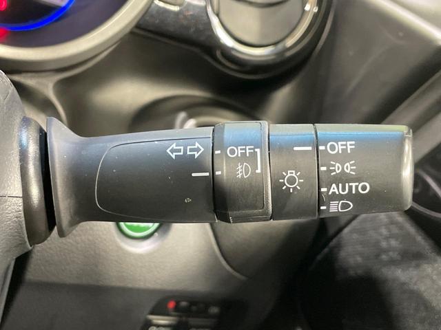 N-BOXカスタム G・ターボパッケージ ターボ 両側電動ドア 純正SDナビ バックカメラ スマートキー HIDヘッド ETC クルコン オートライト オートエアコン 純正15インチアルミ CD DVD再生 地デジ パドルシフト(29枚目)