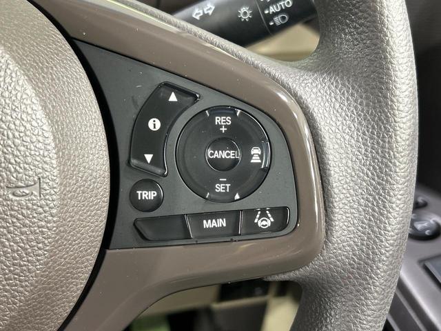 N-BOX G・Lホンダセンシング 禁煙車 純正SDナビ バックカメラ ホンダセンシング 電動スライドドア LEDヘッドライト シートヒーター ETC レーダークルーズコントロール スマートキー Bluetooth再生 DVD/CD再生(7枚目)