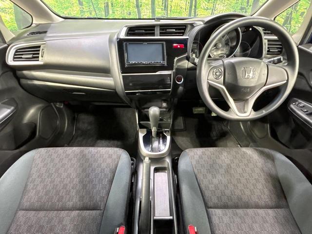 フィット 13G・Fパッケージ SDナビ バックカメラ?シティブレーキアクティブシステム 禁煙車 前後ドライブレコーダー スマートキー ETC Bluetooth再生 CD/DVD再生 フルセグ ステアリングスイッチ(2枚目)