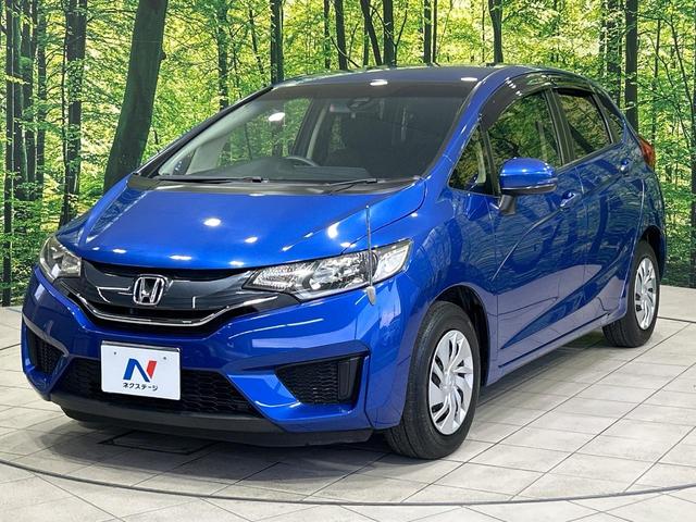 フィット 13G・Fパッケージ SDナビ バックカメラ?シティブレーキアクティブシステム 禁煙車 前後ドライブレコーダー スマートキー ETC Bluetooth再生 CD/DVD再生 フルセグ ステアリングスイッチ(24枚目)